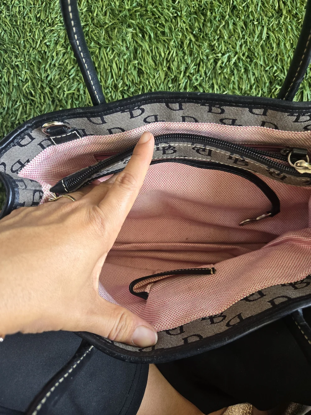 Dooney & Bourke Beige and Black Monogram Satchel with Buckle Accent